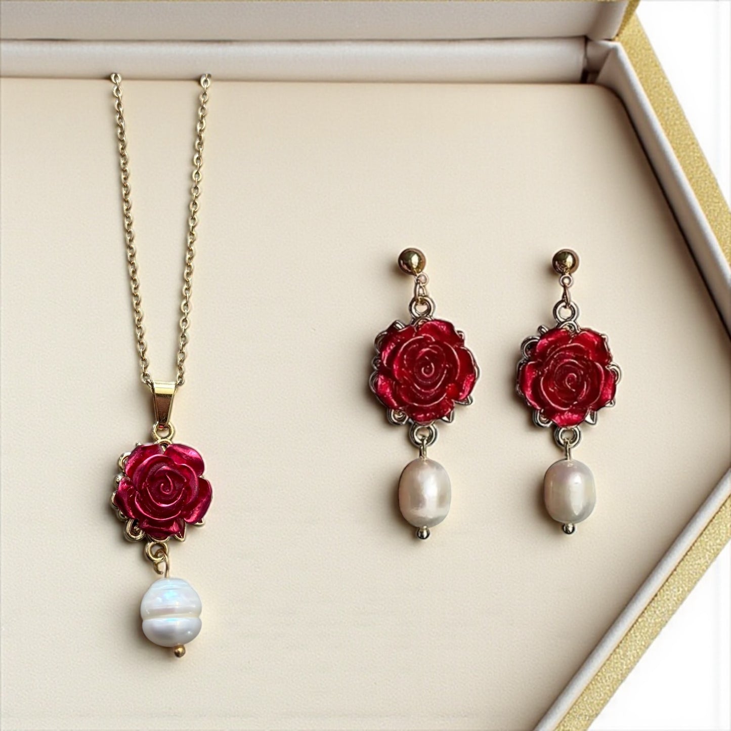 Jewelry set with red rose pendants and pearl drops 