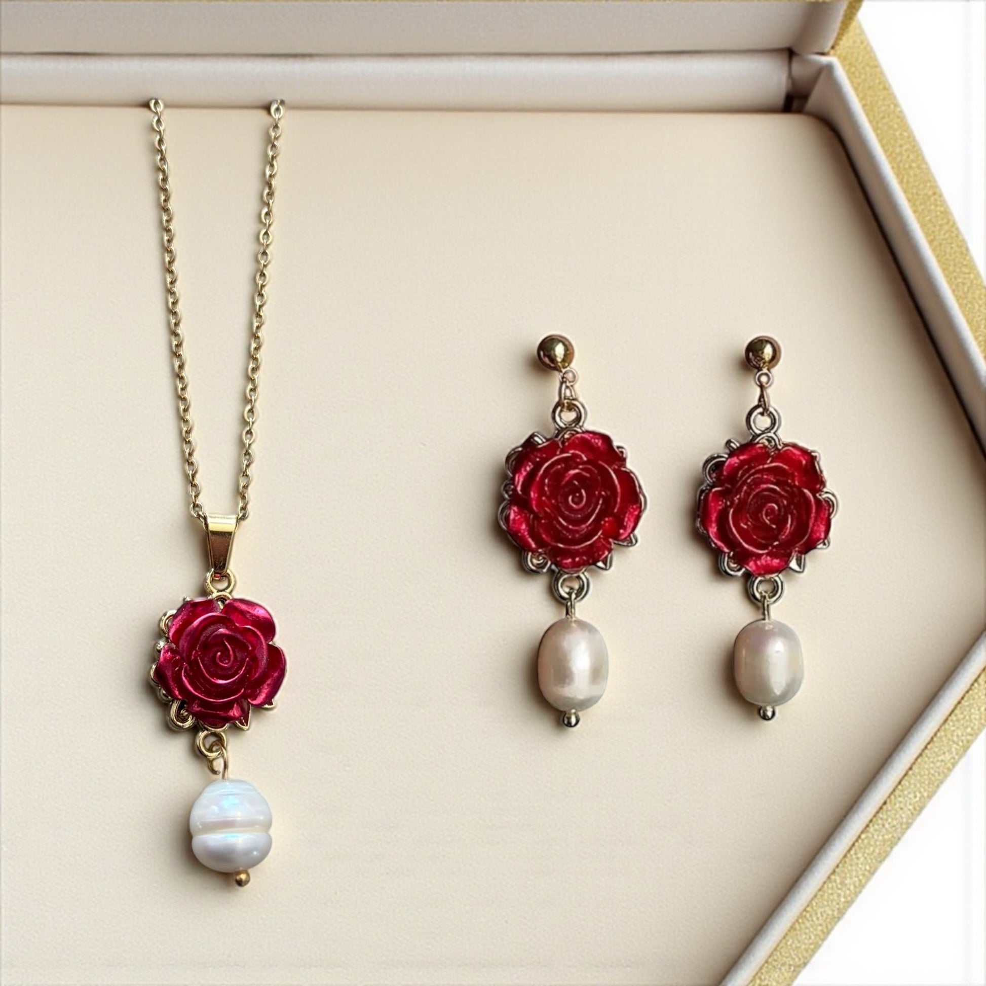 Jewelry set with red rose pendants and pearl drops 